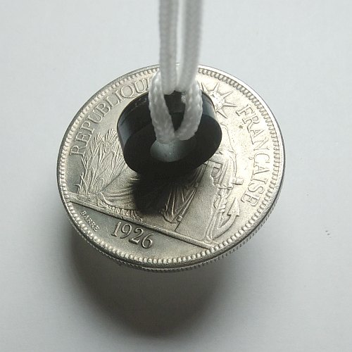 counterfeit coin detected with a magnet